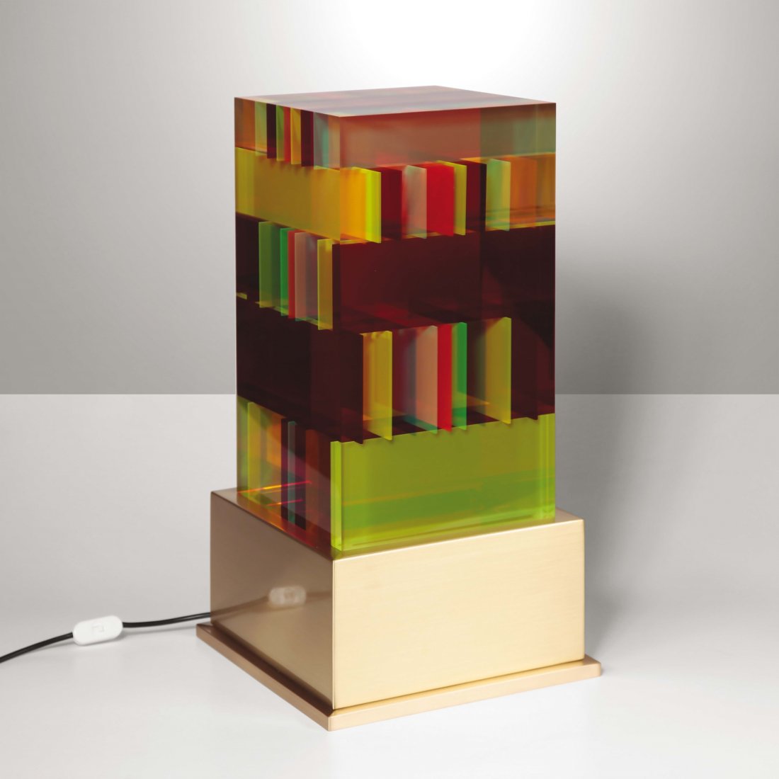 Studio Superego,: Lampada in plexiglas e ottone lucido. Prod. Studio Superego, Italia, 2010 ca cm 33x60xp33