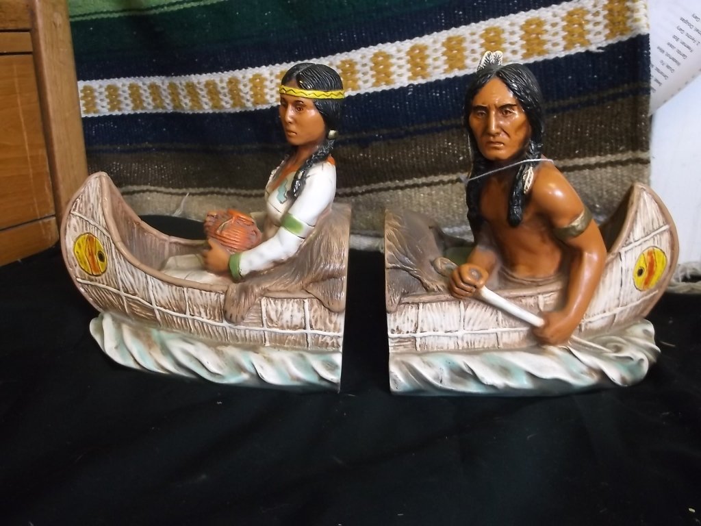 c1979 Universal Statuary Native American Bookends: Split canoe, beautiful maiden with a basket, good looking man, rowing to lunch maybe? Large, useful, colorful and collectible…….Indian Kitsch.