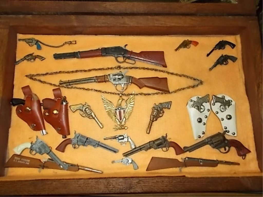 Hanging Display Case with Miniature Guns: Approx 21 Different Miniature Pistols and Rifles