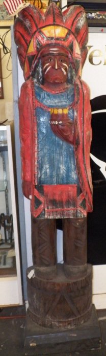 Wooden Cigar Store Indian: Cigar Store Wooden Indian 62 Tall x 13" Base Solid Wood Indian. This Indian Stood outside a Tatto Shop in Modesto Ca. for many years (Good Time Charlies End of the Trail Tatto Shop)
