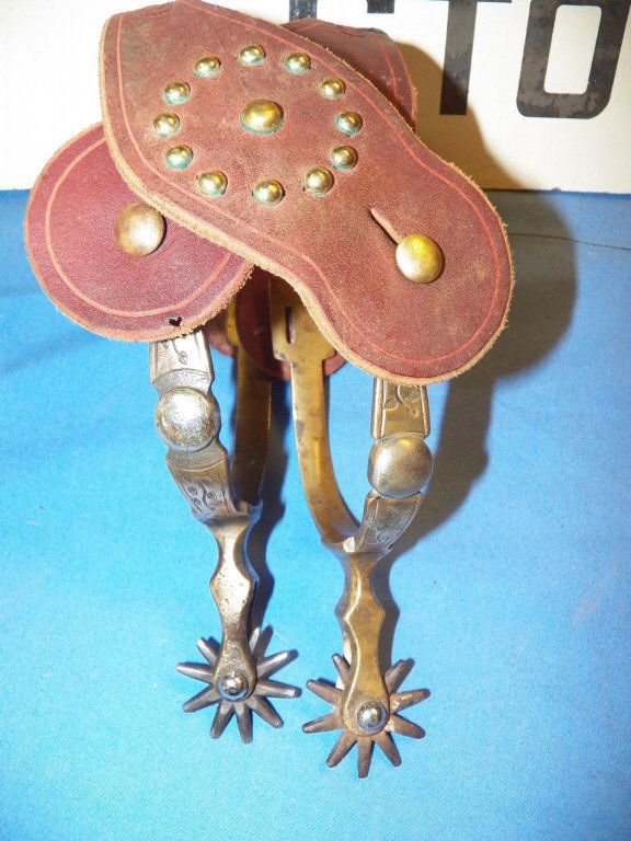 Buermann Single Spot Spurs: Very nice Marked pair Hercules Bronze Single Spot Buermann Spurs with nice Shanks Bros. Spotted Straps