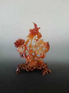 ANTIQUE AGATE STATUE OF BIRD AND LANDSCAPE.: This statue is of red, yellow and white. This is showing a bird standing on leaves or tree resting. A wooden stand is included. H 7.25" (18.25cm) W 6" (15cm)