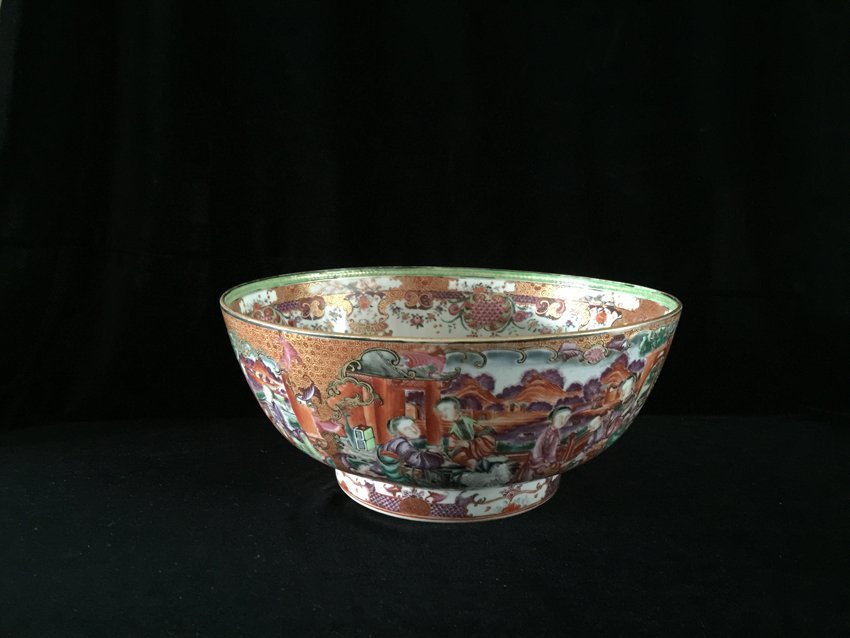ANTIQUE FAMILLE ROSE CITIZEN FIGURE PORCELAIN BOWL: This famille rose bowl is colorfully showing a rich amount of contents within a figure on both inside and outside. The bowl is primarily red and each figure panel is a story of citizen drawn on the bo
