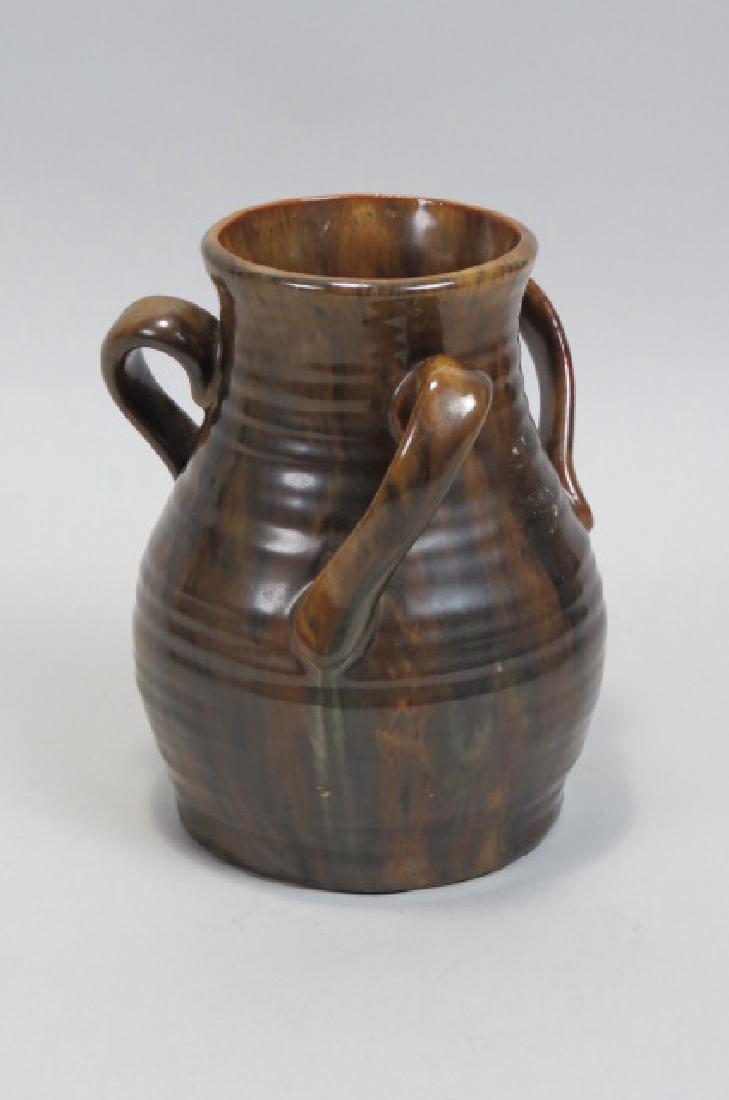 Fulper Pottery Vase,: Fulper Pottery Vase, brown slip glaze on ribbed body, swirling tri-handled, signed, 7", excellent. Fulper Pottery was incorporated in 1809 by the Fulper Brothers in Flemington, New Jersey. The most ea