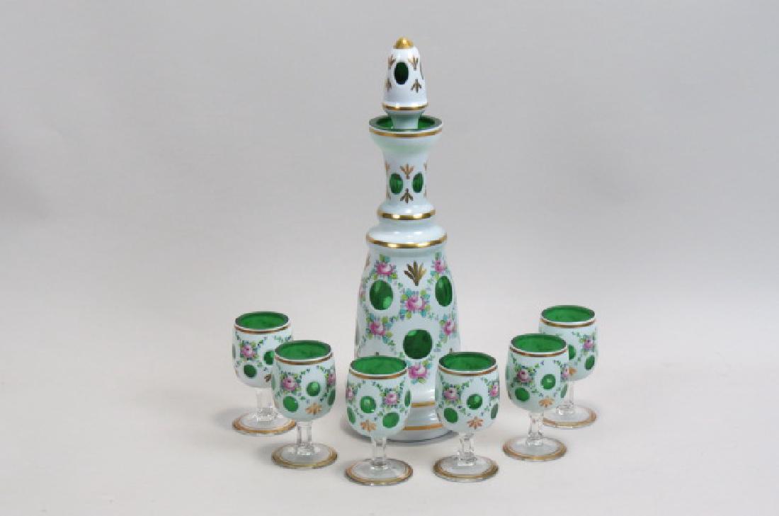 Emerald Cut-Back Cased Glass Decanter,: Emerald Cut-Back Cased Glass Decanter, with six matching glasses, handpainted floral on white with green coin spot medallions & interior, 15" decanter, excellent.