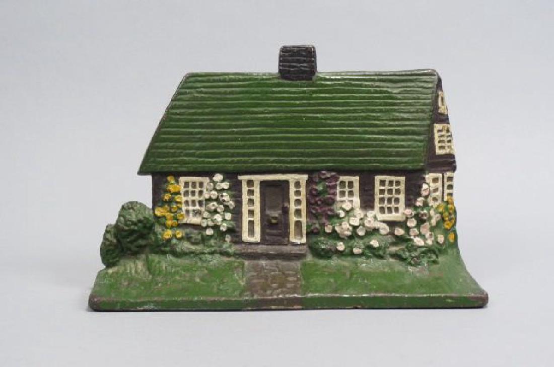 Cast Iron Cottage Doorstop, (1 of 3)