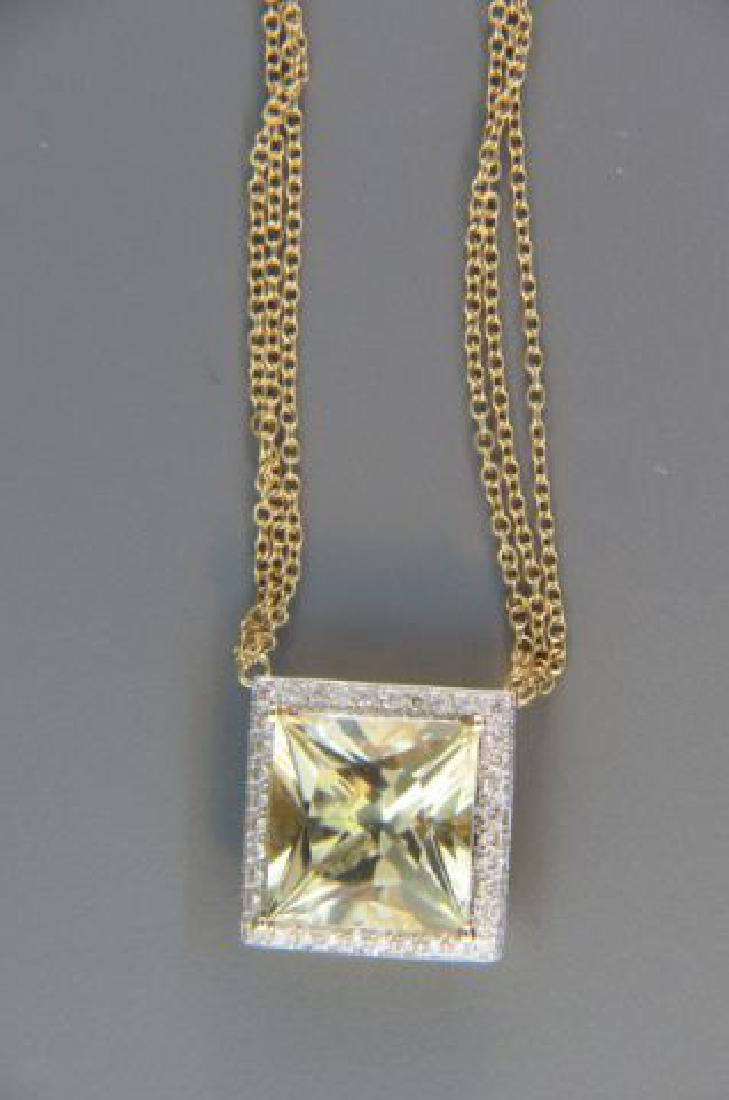 Lemon Quartz & Diamond Pendant,: Lemon Quartz & Diamond Pendant, vivid 9 carat gem surrounded by 36 diamonds totaling .30 carat, 14k yellow gold, with appraisal of $1500, 17" long.