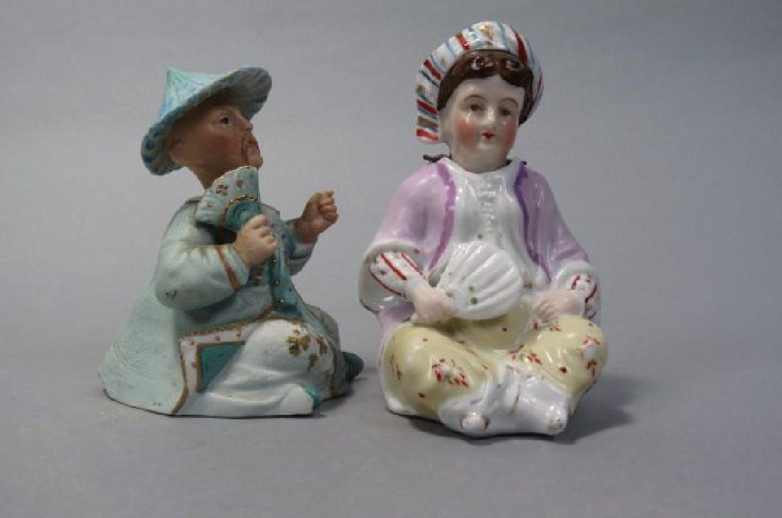 Pair of Porcelain Nodder Figurines, (1 of 2)