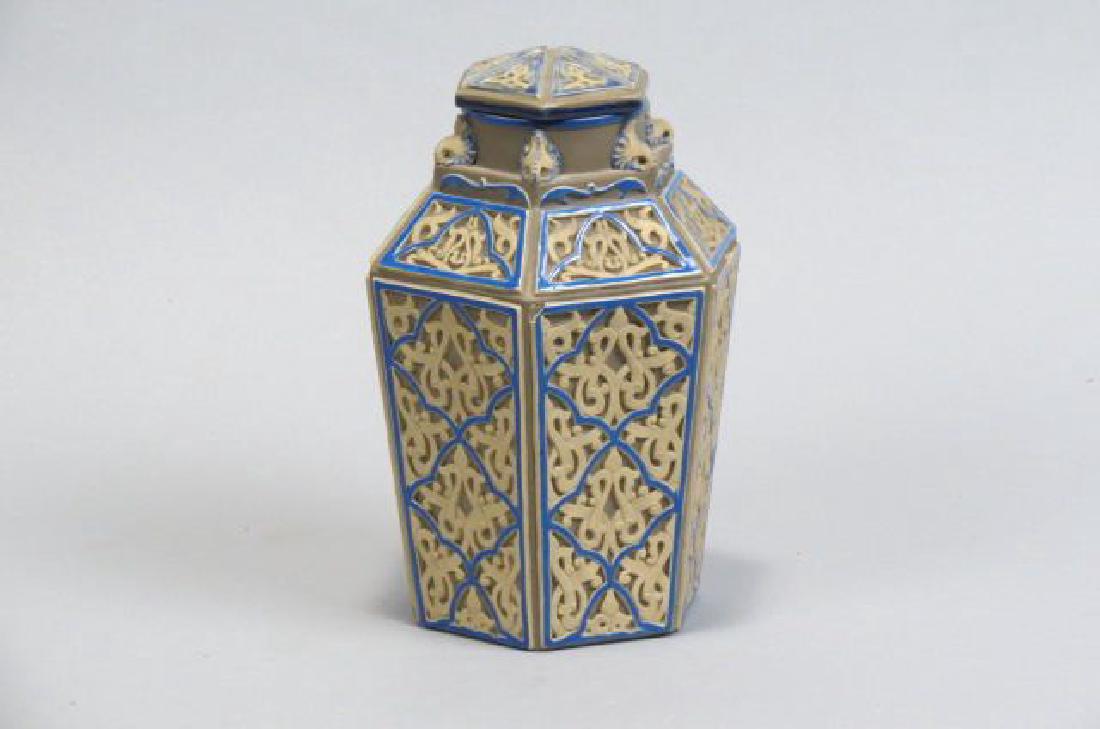 Mettlach Pottery Jar,: raised designs on brown field, late 19th century, 7", unmarked, excellent.