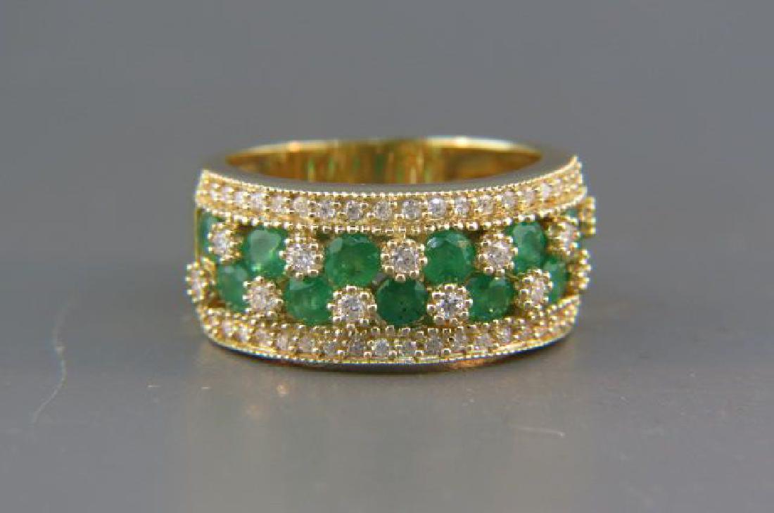 Emerald & Diamond Ring,: 12 round emeralds and 52 round diamonds, over 1 carat total in gems, 14K yellow gold band style setting, currently size 7.