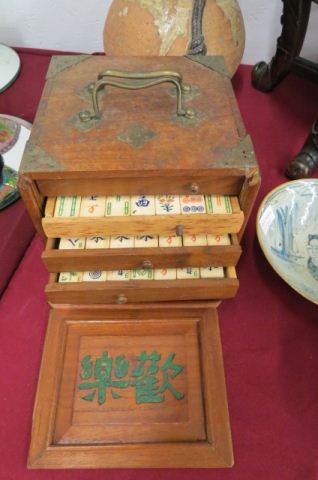 Chinese Mah Jong Set,: bone and bamboo pieces in wooden cabinet.