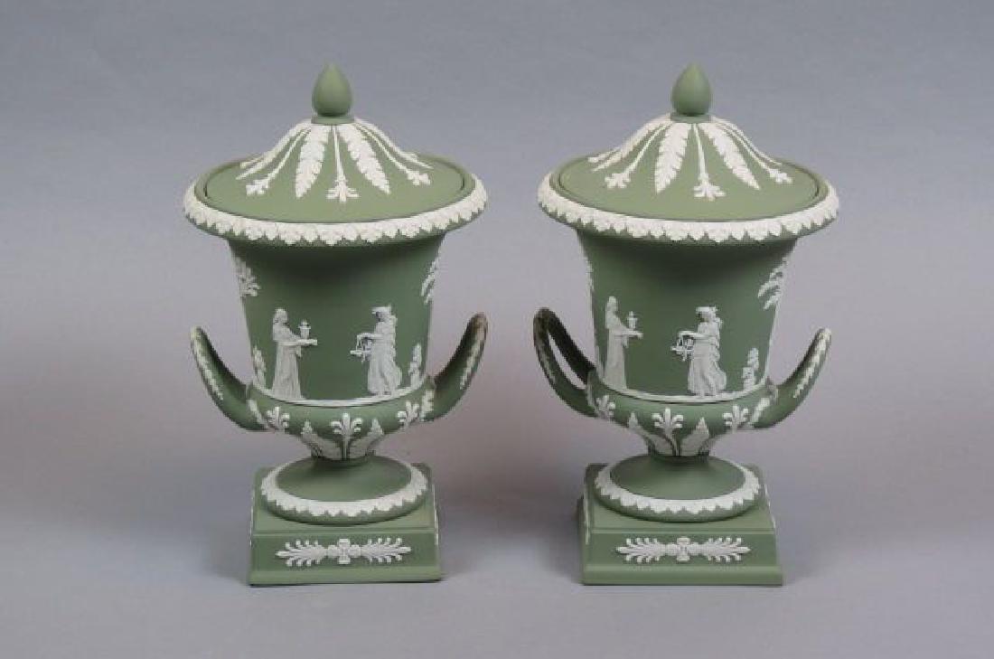 Pair of Wedgwood Green Jasperware Urns,: classical scenes with maidens and deer, handled, 11 1/2", excellent.