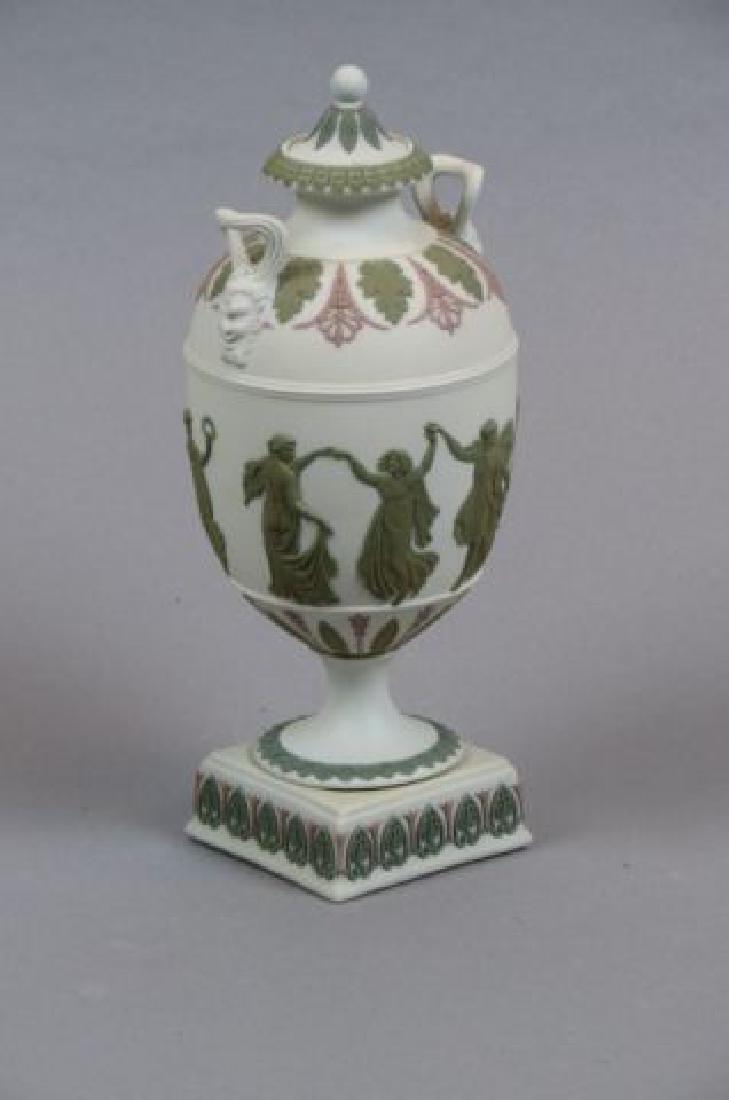 Wedgwood Multi-color Jasperware Jar,: dancing maidens, mythological god handles, classical urn shape, low pedestal base, 9", excellent.