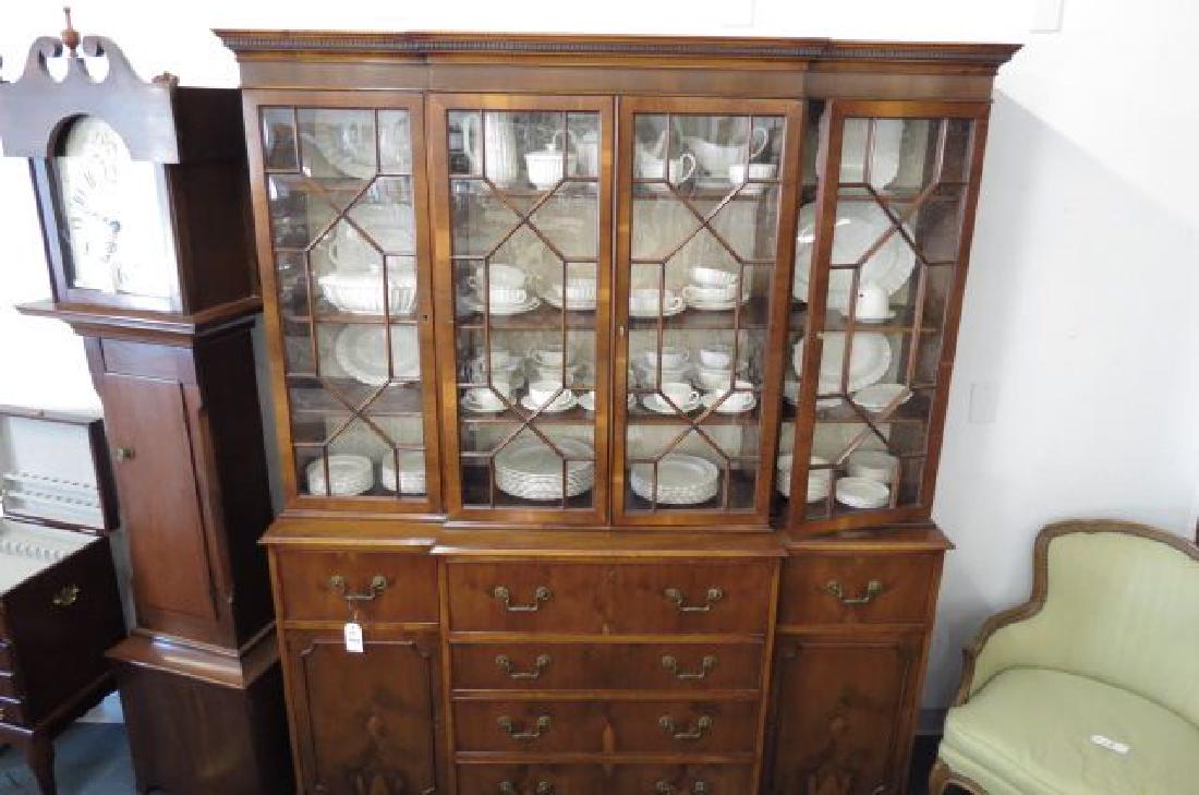 Mahogany Breakfront,: glass doors above pull out desk, side drawers, lower drawers and doors, 65" wide, 83" tall, 18" deep.