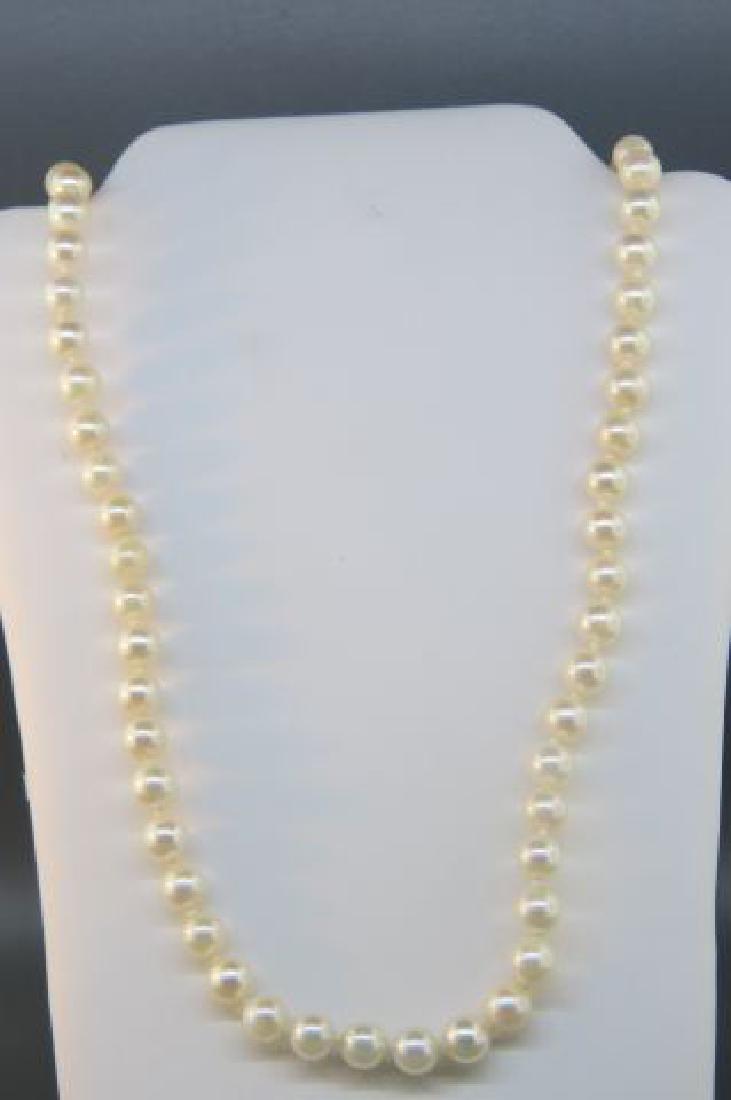 Pearl Necklace, 86 cream rose pearls,: 5.5 to 6 mm, 14K clasp, 22" long.