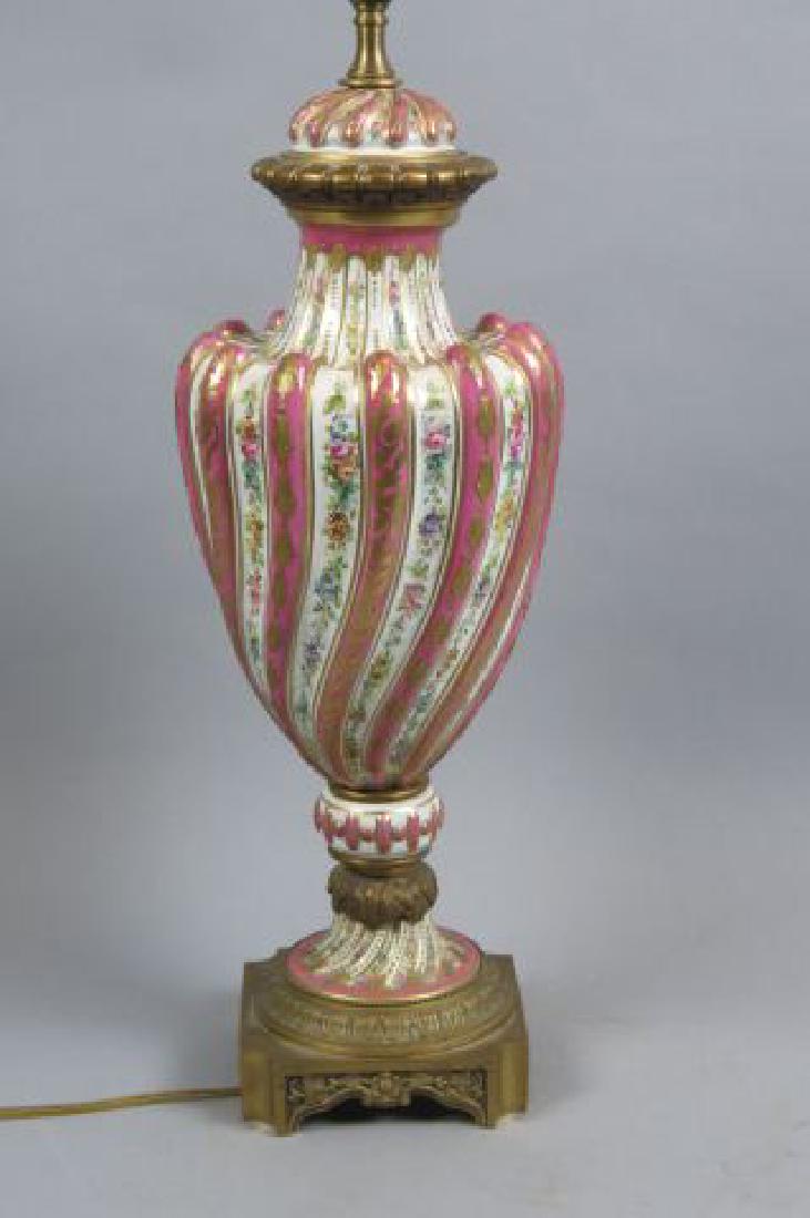 Sevres French Porcelain & Bronze Lamp,: handpainted floral with alternation pink and gold decorated ribbed swirl, 18" tall (plus lighting), 19th century.