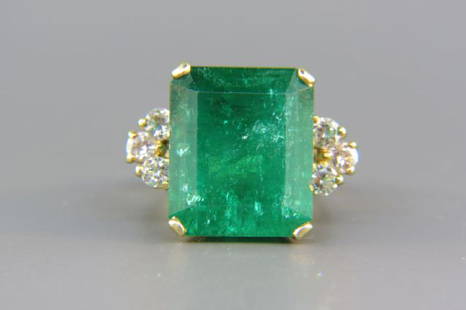 Large Emerald & Diamond Ring,: 17.59 carat emerald cut gem with 6 round diamonds totaling .65 carat in 18K yellow gold, with appraisal of $14,550.00, currently size 6 1/2.