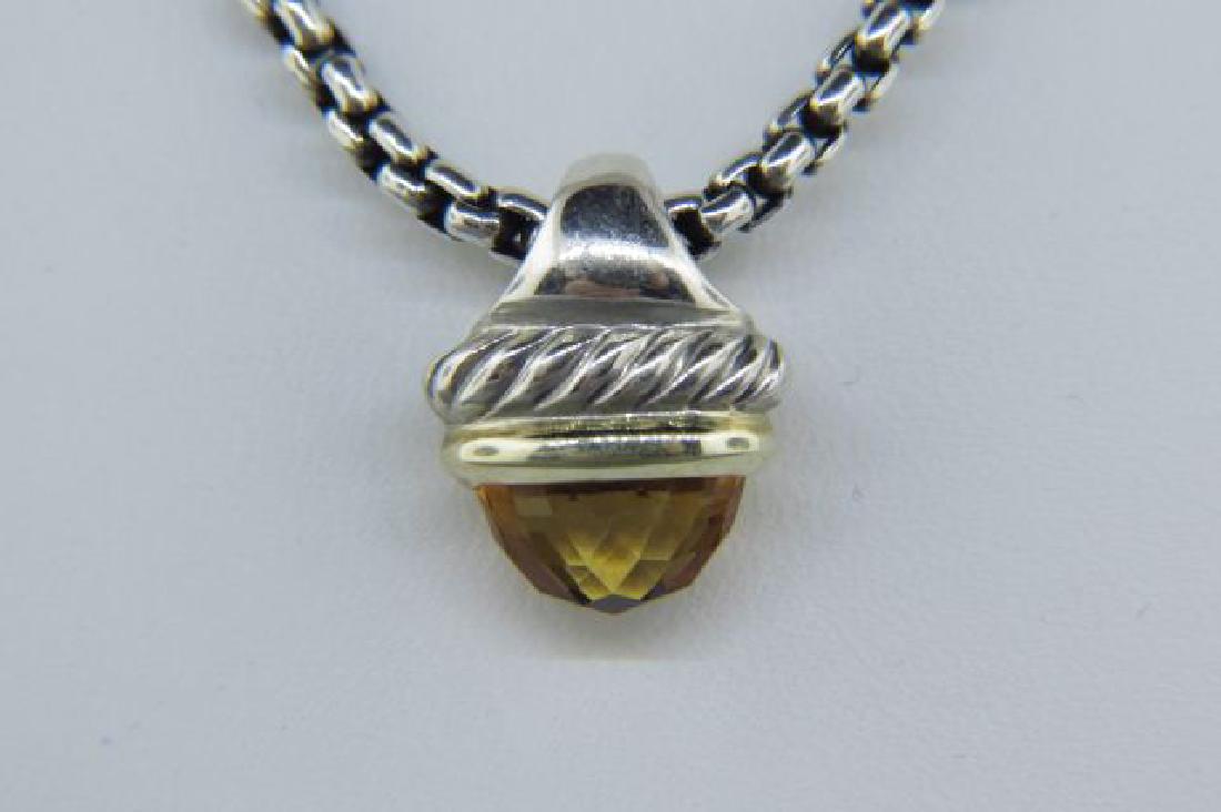 David Yurman 14K Gold & Sterling Citrine Necklace,: pendant having a fancy cut cabochon gem, signed, 16" long...........David Yurman is a timeless model of inspiration, innovation and consummate craftsmanship. America’s foremost luxury jewelry and ti