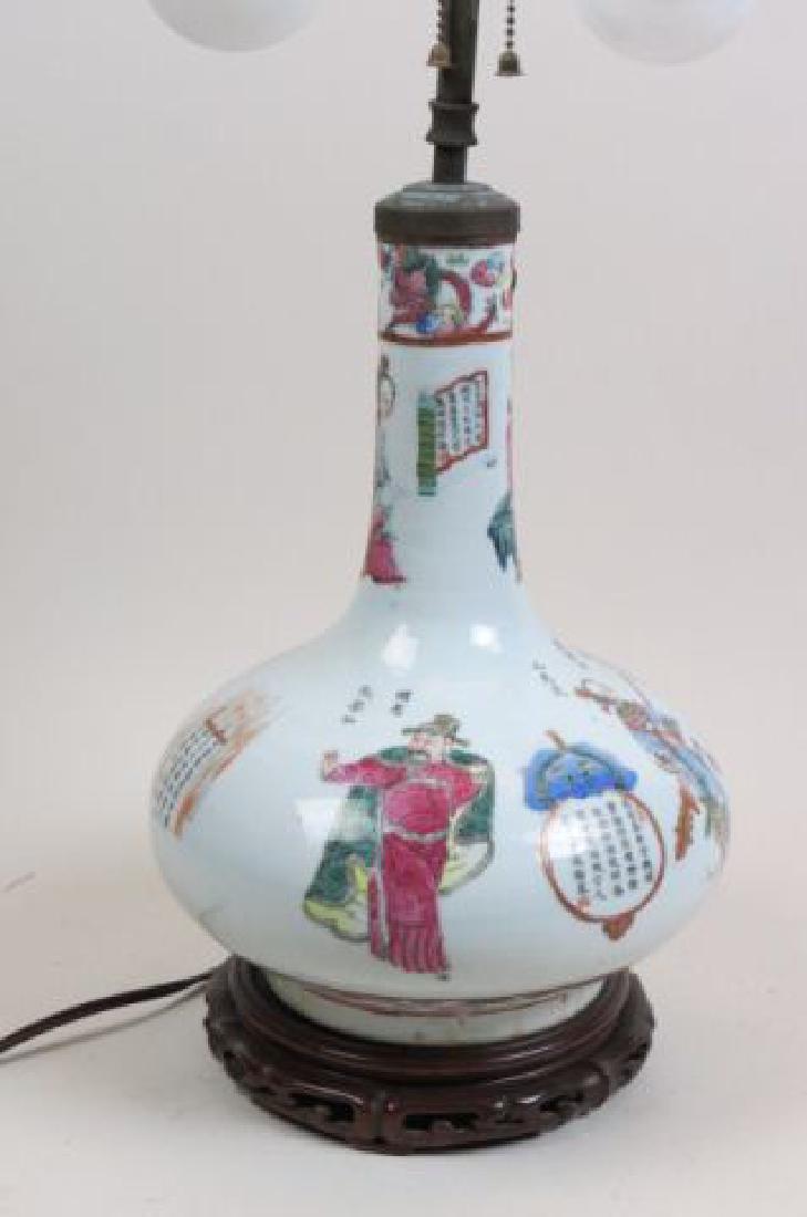 Chinese Porcelain Lamp with Calligraphy & Figures,: a early 12" porcealin body depicting various immortals, animals and more, old staple repair to neck.