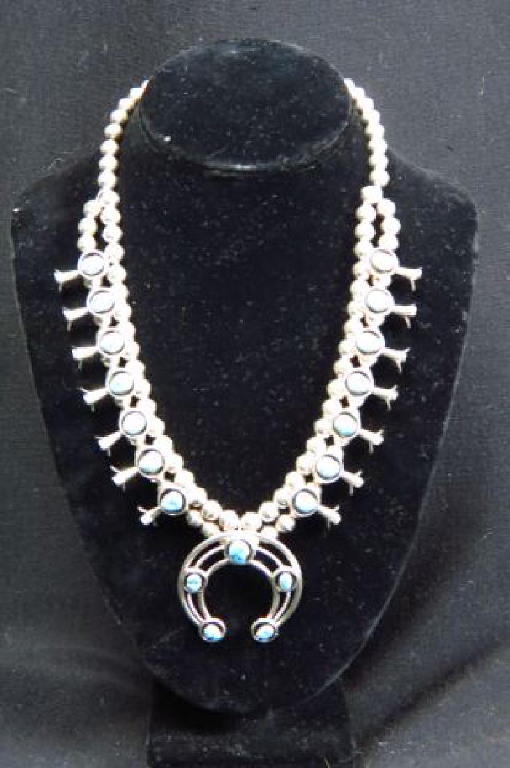 Indian Squash Blossom Necklace,: rich natural turquoise, signed P.G., 19" long plus pendant.