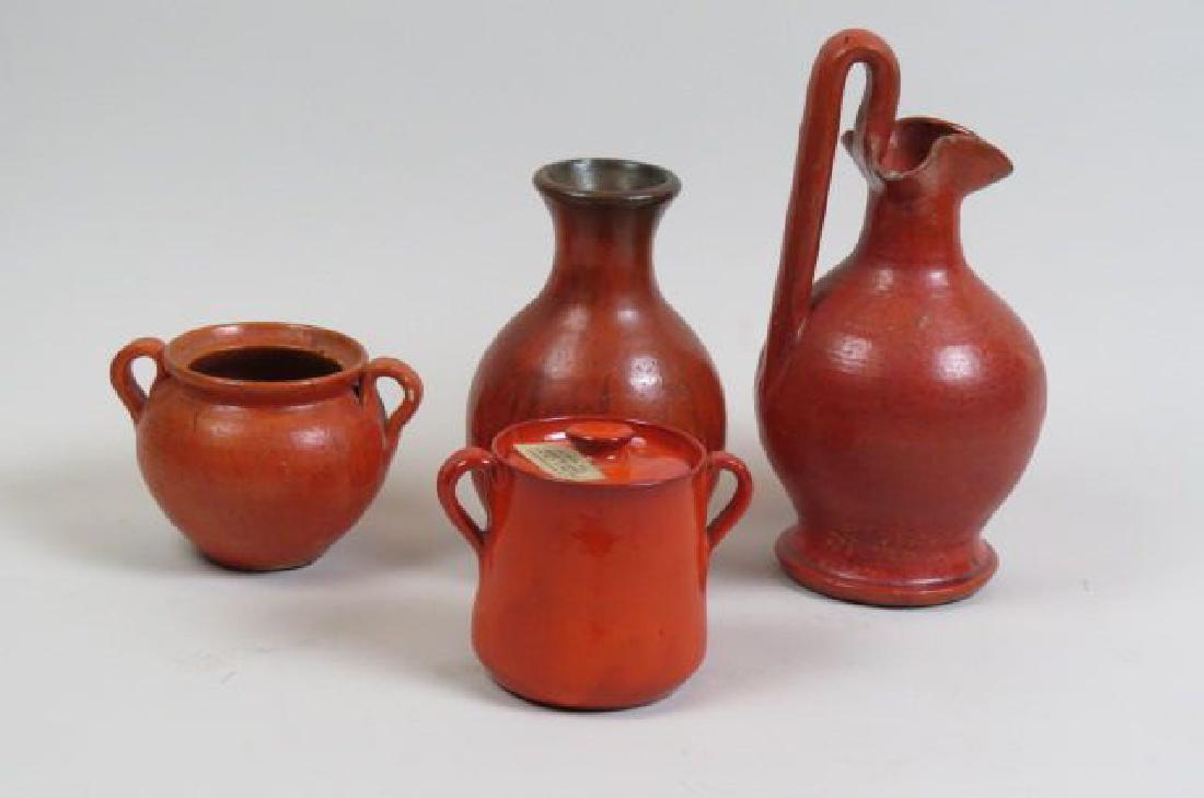 4 pcs. Cole North Carolina Pottery,: Sanford, red glazes, tallest is 8 1/2" pitcher........Arthur Ray (AR) Cole (1892 to 1974), son of Ruffin Cole and brother to Charlie (CC) Cole, worked in his father’s pottery shop in Seagrove, North