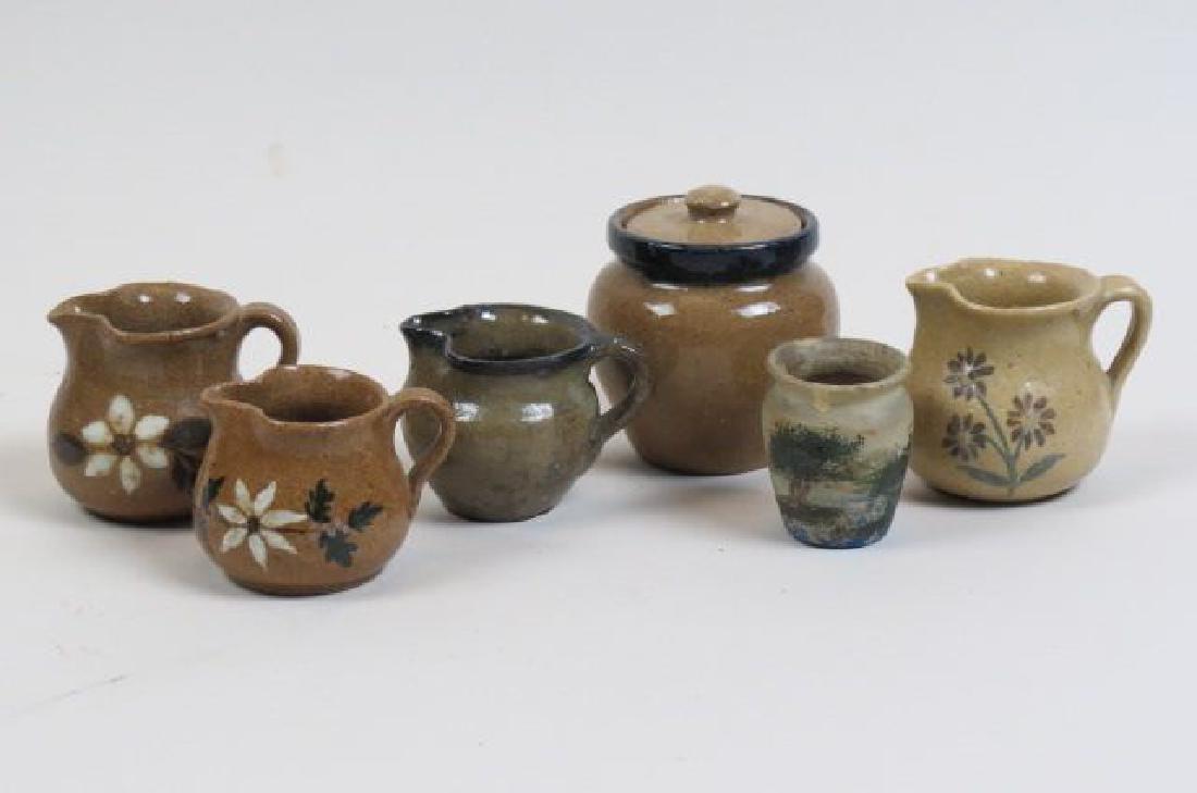 6 pcs. Hilton North Carolina Pottery,: creamers, jar and early landscape decorated piece, tallest is 3'.