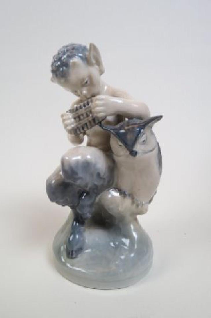 Royal Copenhagen Porcelain Figurine of a Faun: with Owl, playing a flute, #2107, 6 1/2", excellent.
