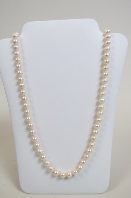 Pearl Necklace, up to opera length: cultured with special 14K gold clasps that surround pearls where ever you like, making size what ever you like up to 32" long.