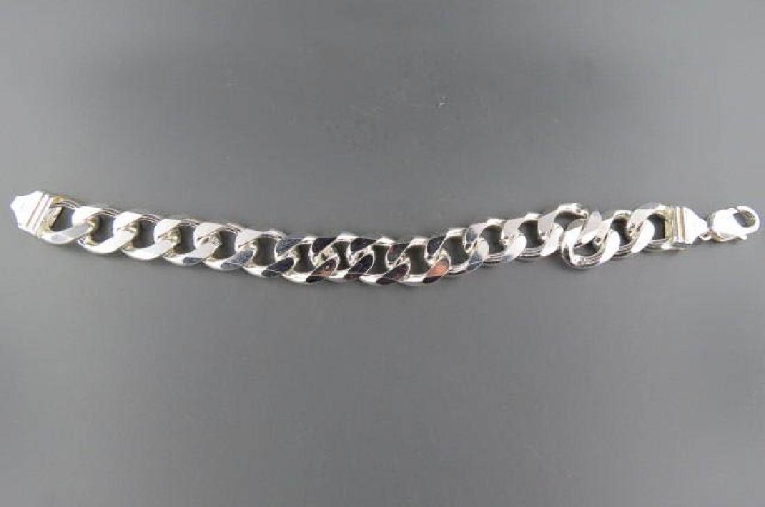 Sterling Silver Man's Bracelet,: Cuban link, 1/2" wide, 9" long, 73 grams.