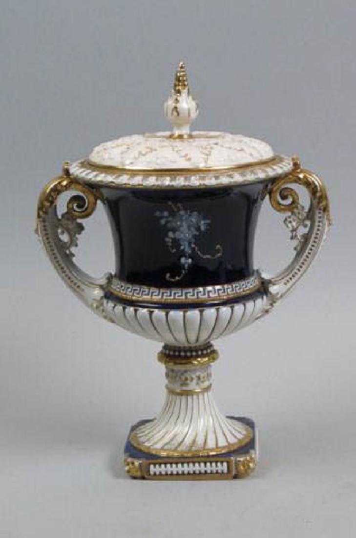 R.S.T.K. Teplitz Porcelain Urn,: classic form with cobalt and gold decoration on white, handpainted floral, pedestal base, 11", excellent......You may know an amphora as a type of large two-handled Grecian vase originally designed fo