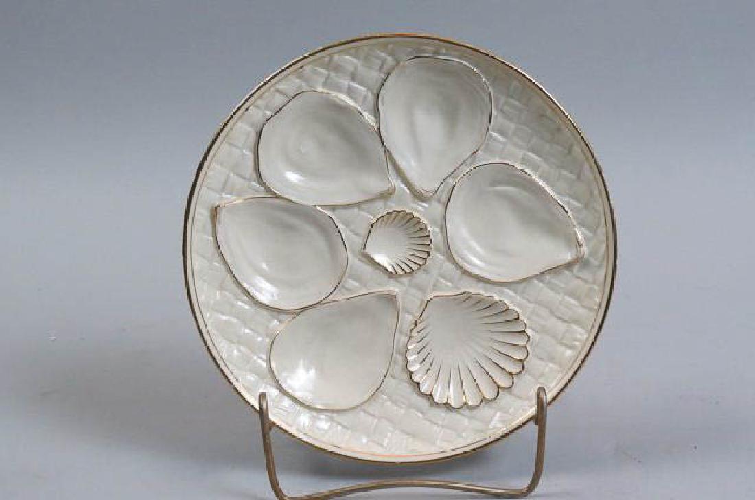Royal Worcester Porcelain Oyster Plate,: shell and basketweave on ivory field, gold trim, 8 1/4", excellent.