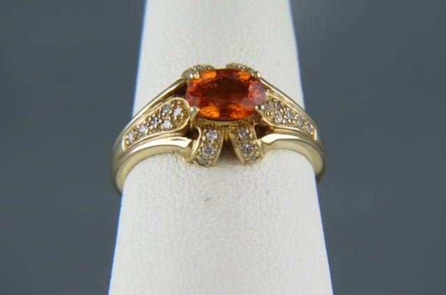 Spessartite Garnet & Diamond 14K Gold Ring,: rich orange oval gem weighing 1.11 carat and 24 round diamonds totaling .12 carat in 14k yellow gold, with appraisal of $1280.00, currently size 6 1/2.