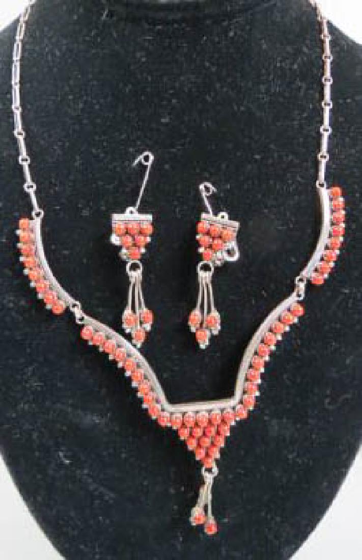G. Eriacho Native American Coral Necklace Earrings: bead set balls, dangling ends, 20" long necklace, 1 1/2" clip style earrings, signed.