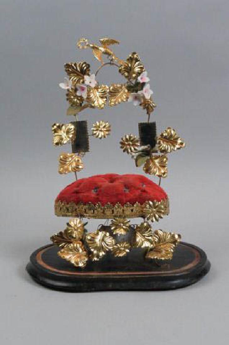 French Victorian Pin Cushion Dresser Piece,: bird & wreath at top, brass florals, mirrors to highlight, wood base, lacks glass dome, 14" tall.