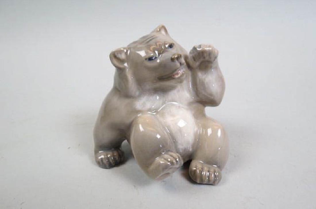 Royal Copenhagen Porcelain Figurine of a Bear Cub,: playful seated pose, #1233/2842, 3 3/4" tall, excellent.