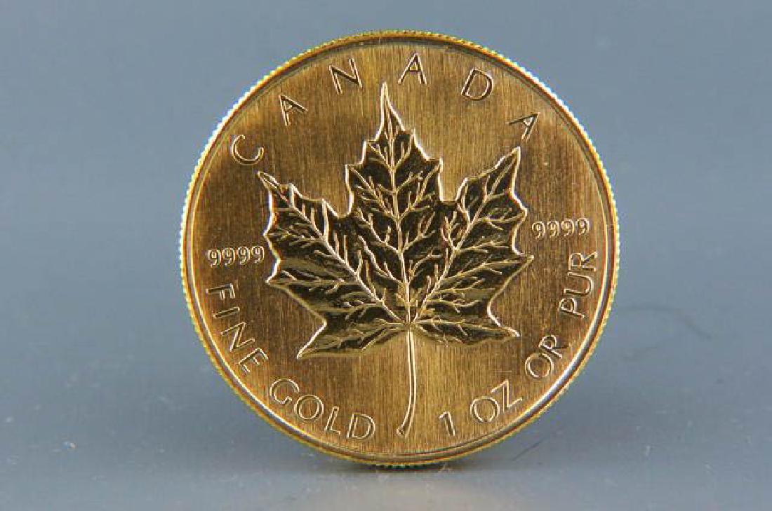 1990 Canada $50.00 Gold Coin, Maple Leaf, 1 Oz.: uncirculated, one fine ounce, .999 pure gold.