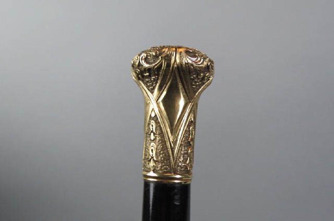 Victorian Gold Handled Walking Stick,: elaborate knob handle, no monogram, fine engraved design, unmarked, ebony stick, overall 33 1/2".