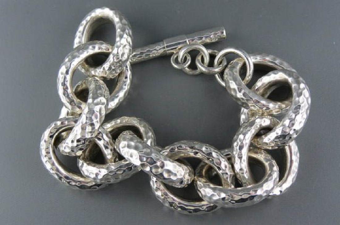 Large Sterling Silver Link Bracelet,: hand hammered design on oval links, 1 1/8" wide, 10" long, 81 grams.