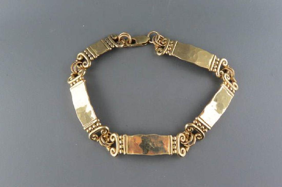14k Gold Bracelet,: hammered bar & ball designs, 32 grams, 8 1/2" long, 3/8" wide.