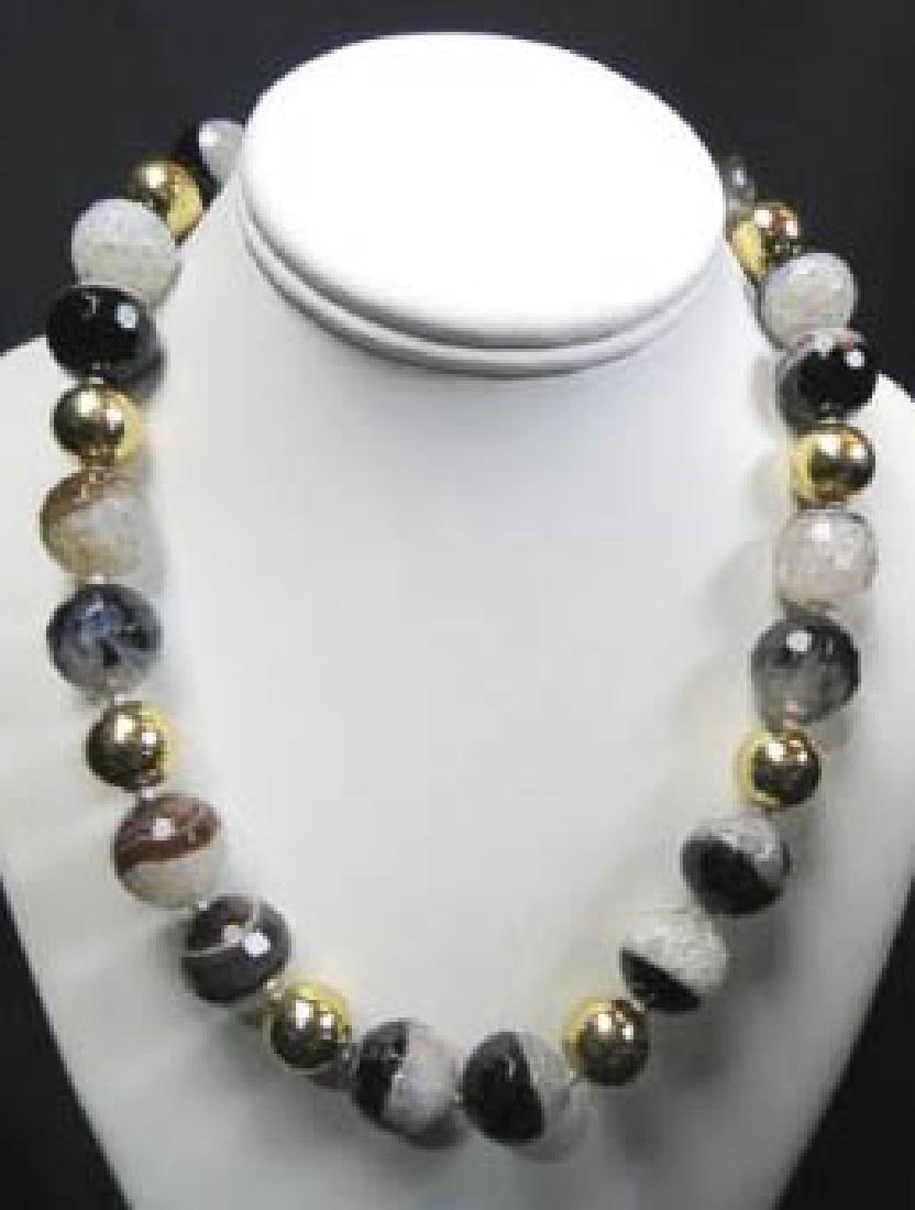 Fine Agate Crystal & Sterling Silver Necklace,: 18 faceted beads of crystal & agate, 17.5 mm each with gold on silver beads between each pair, up to 21" long.