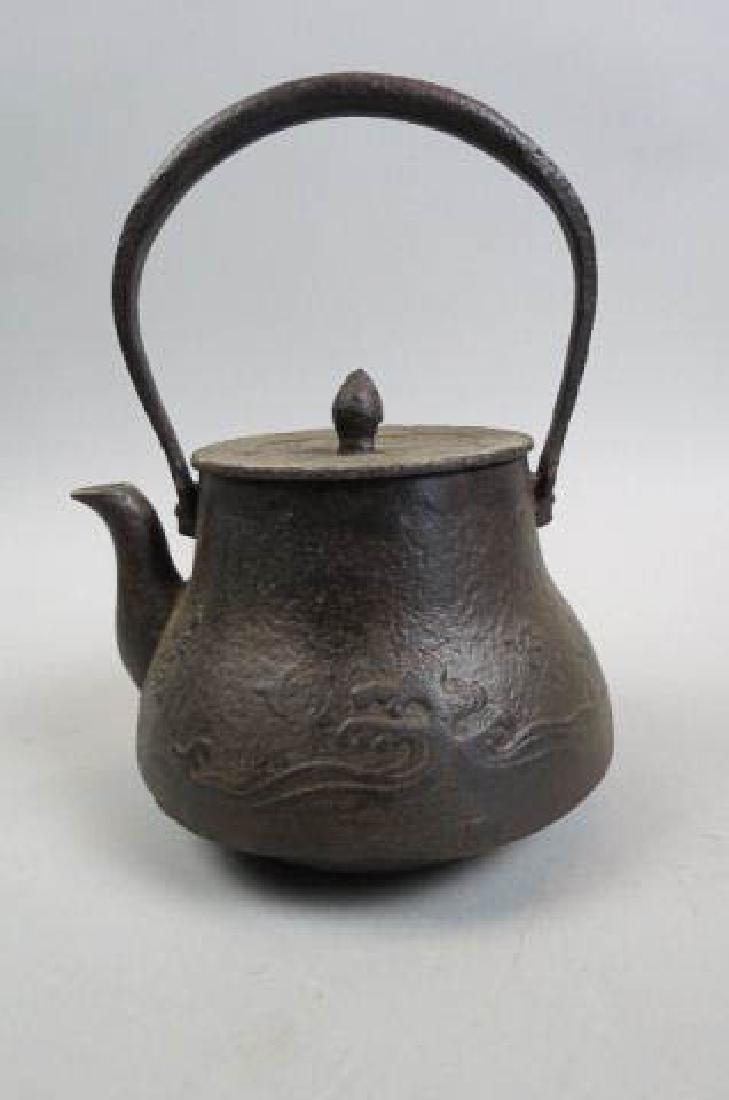 Japanese Cast Iron Teapot Tetsubin: raised wave and birds in flight decoration, 9 1/2".