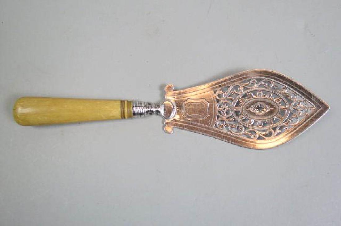 1794 English Sterling Silver Pie or Cake Server,: hallmarks of London, fancy reticulated blade, carved handle, 12" long, a nice 18th century server.