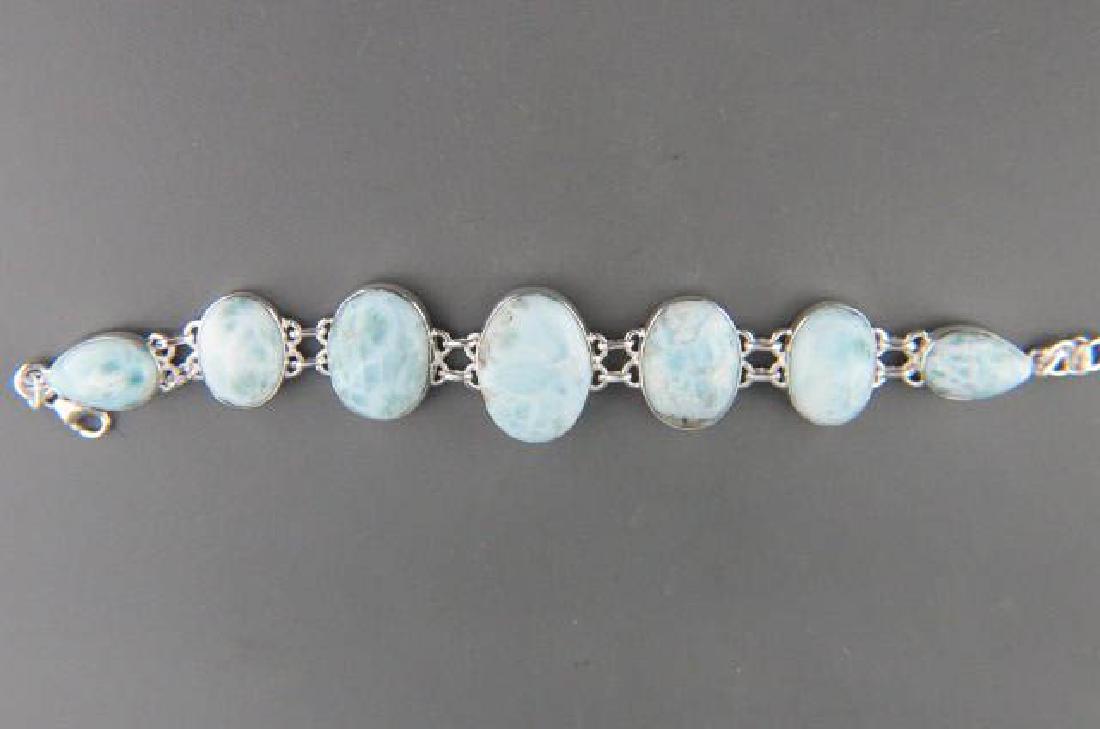 Larimar Sterling Silver Bracelet,: 7 cabochons in sterling silver, soft blues, 7" long.