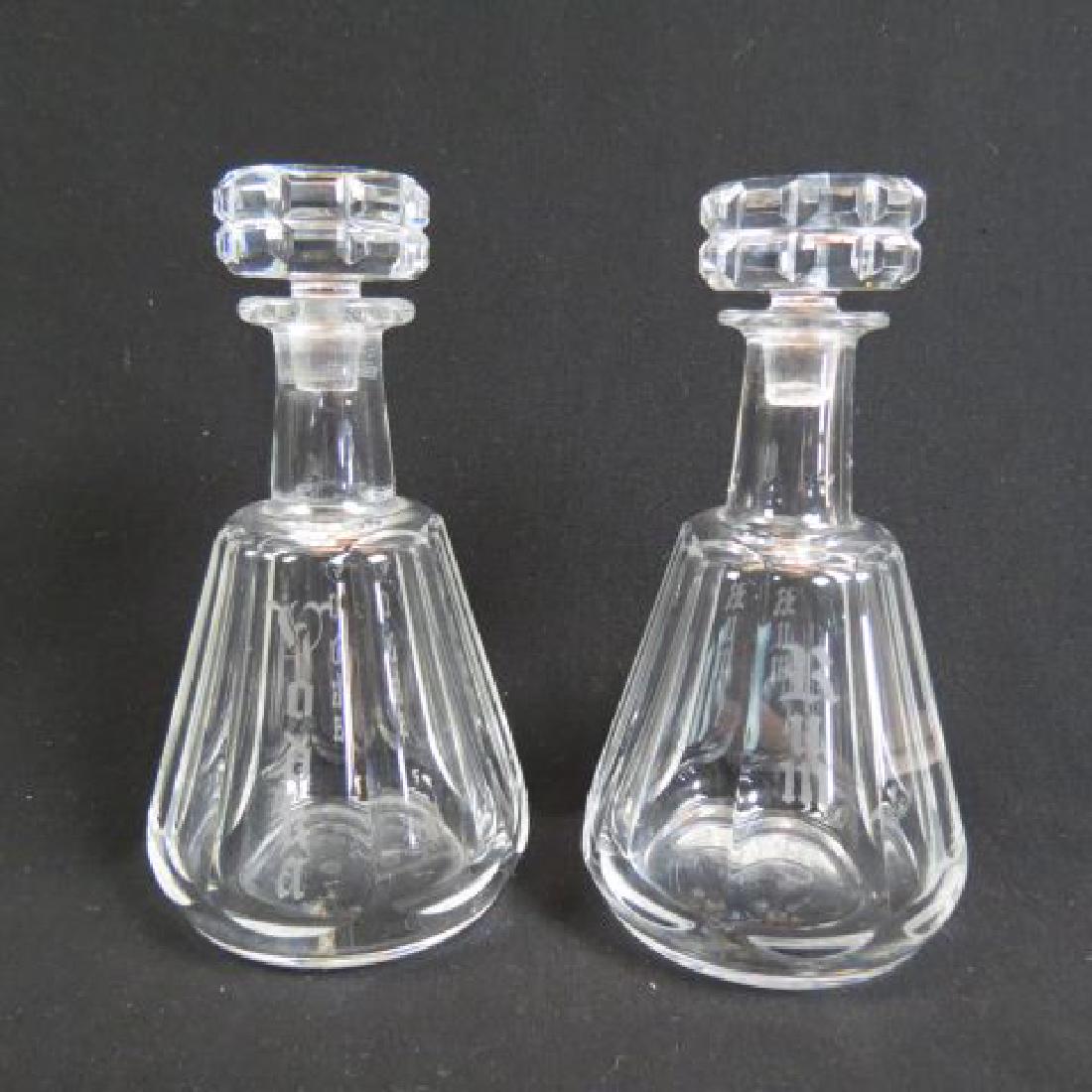 Pair of Baccarat Cut Crystal Decanters,: panel cut, intaglio cut "Vodka" and "Rum", 9 1/2" tall, signed, excellent.