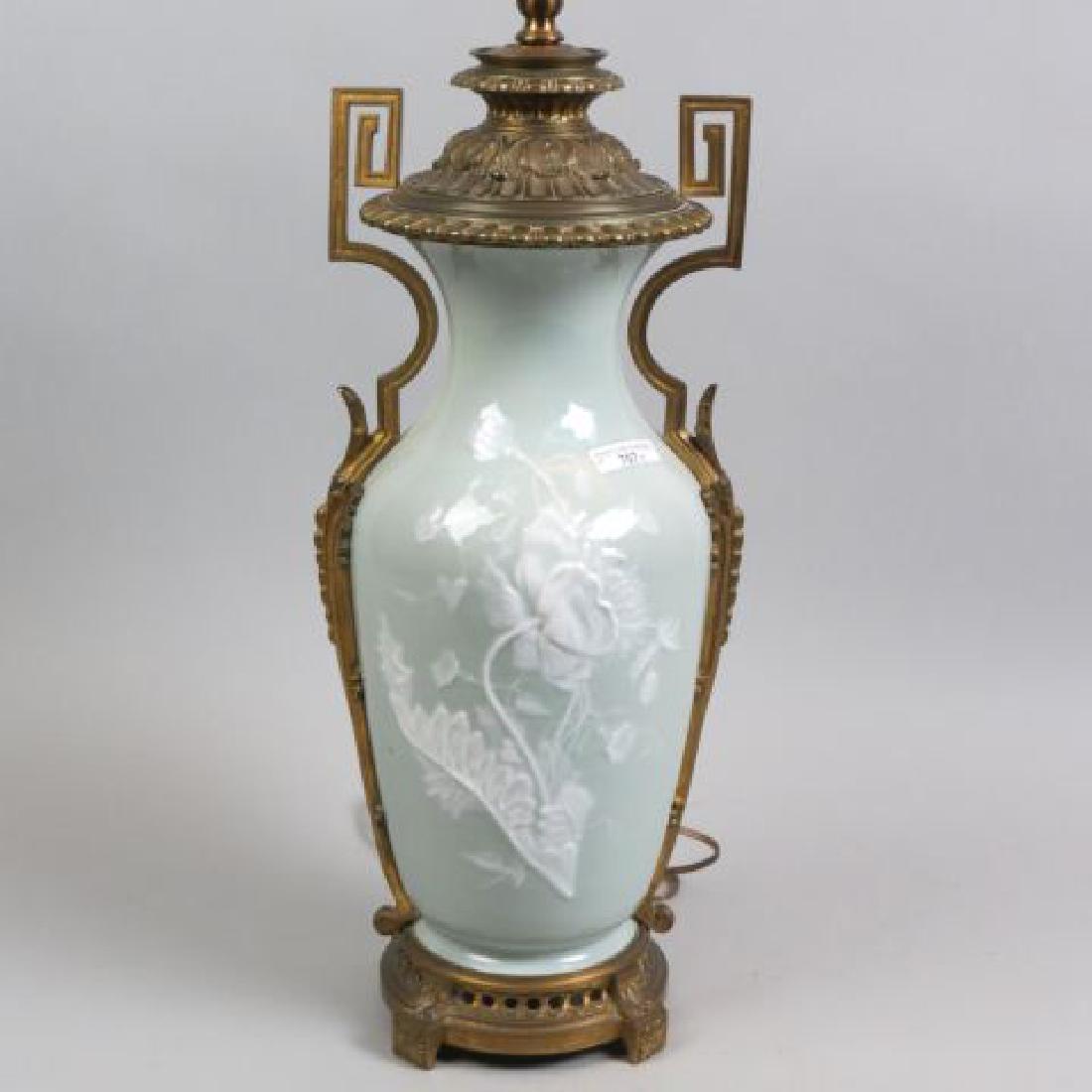 Minton Pate-Sur-Pate Porcelain Table Lamp,: raised floral on soft green field, bronze mounts, 15" porcelain body, a beauty!..............Pâte-sur-pâte is a French term meaning "paste on paste". It is a method of porcelain decoration in which 