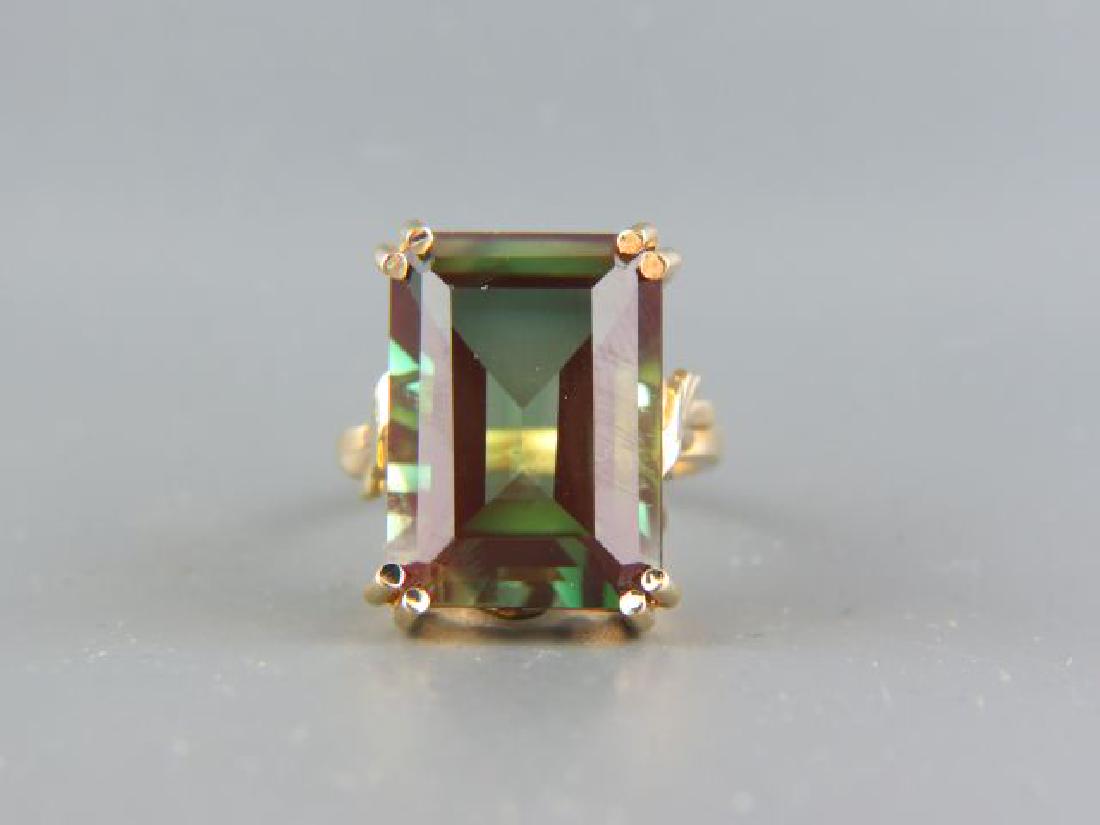 Oregon Green Sunstone 14k Gold Ring,: vivid rectangular gem weighing 16.60 carats in yellow gold, with appraisal of $6565.00, currently size 6......Oregon is the only place in the world where gem grade Sunstones are found containing coppe