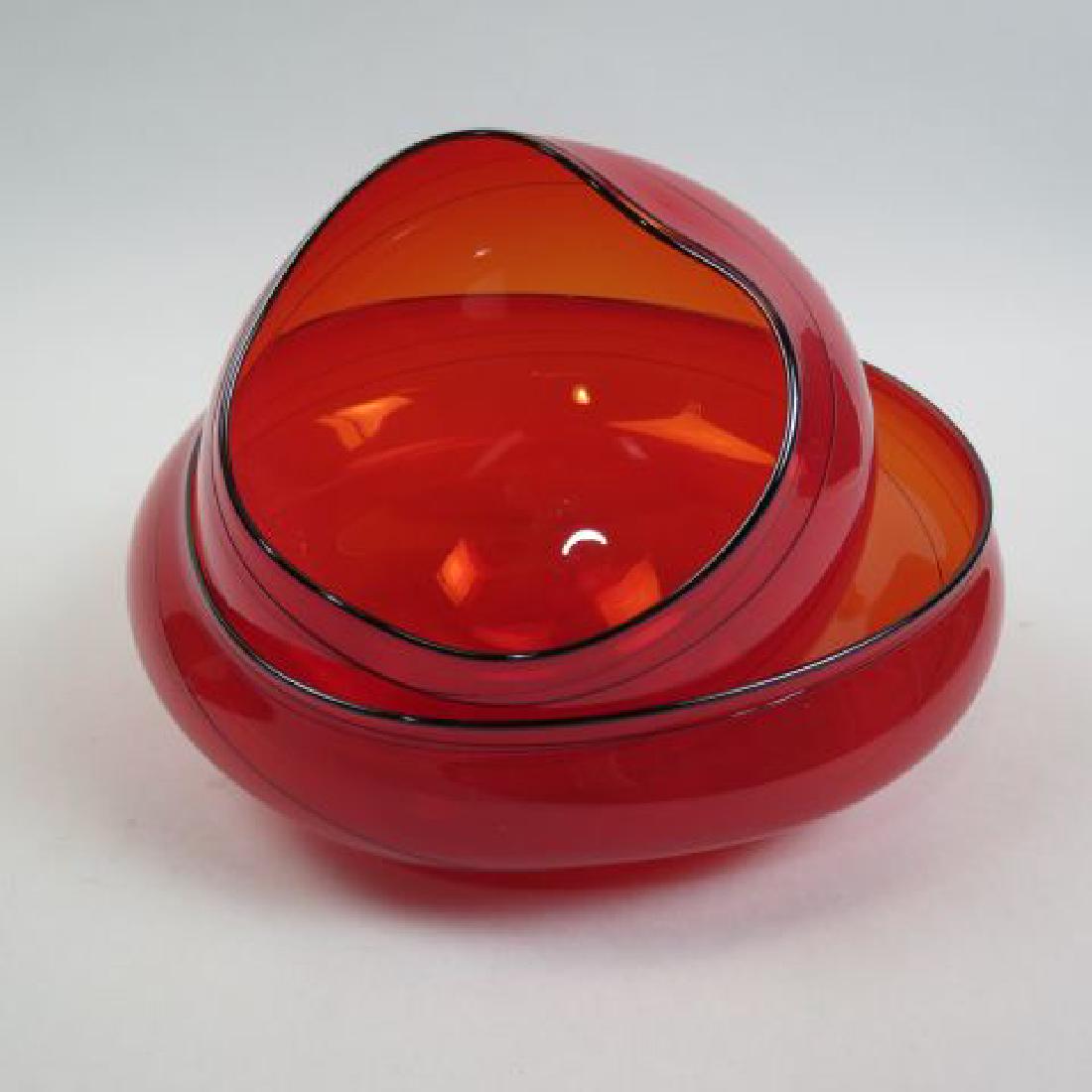 Dale Chihuly Art Glass "Sealife" Bowl,: 2 part, black threading on vivid red, 10 1/2" diameter, signed, excellent....Biography from GallArt.com Born in 1941 in Tacoma, Washington, Dale Chihuly was introduced to glass while studying interior