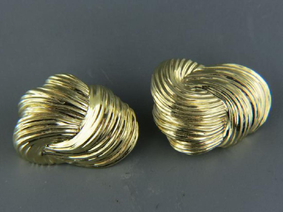14k Gold Designer Earrings,: signed, knot style in yellow gold, Omega pierced clip style, 1", 24.5 grams