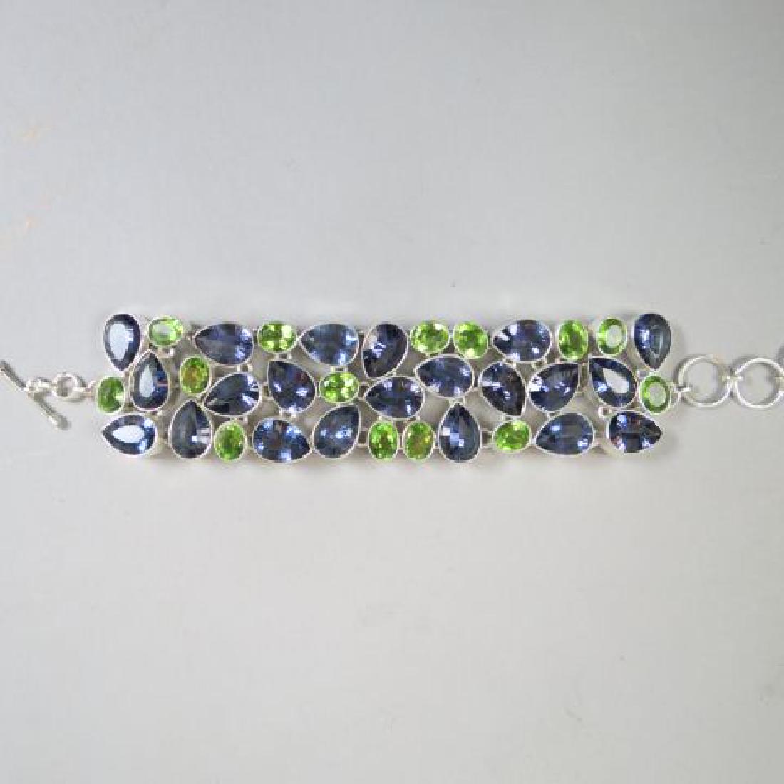 Peridot & Iolite Sterling Silver Bracelet,: oval & pear shaped gems totaling over 200 carats, 1 1/4" wide, 7" to 8" long, 88 grams