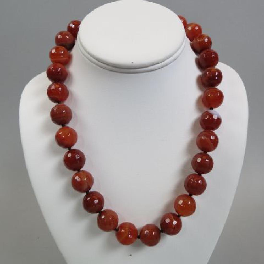 Carnelian Bead Necklace,: 25 faceted beads 15.5mm, with 8 round 8mm beads, sterling toggle clasp, 20" long